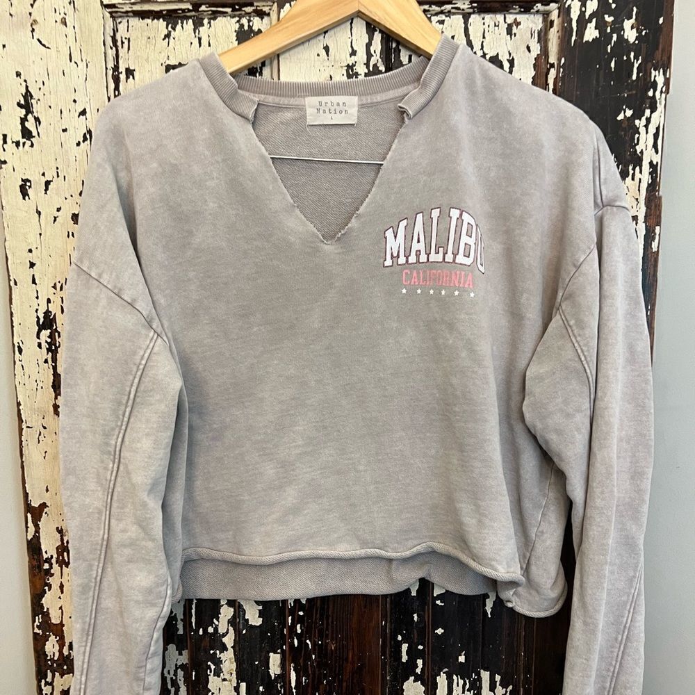 Women’s crop and cut at neck Malibu California sweatshirt . Size L.